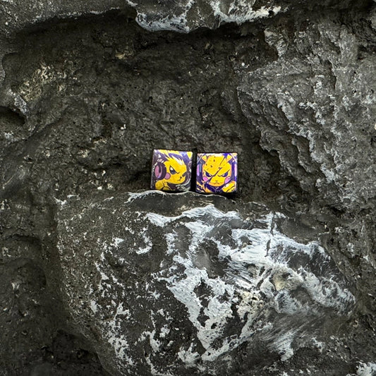 Lightning Pikachu Titanium Lanyard Beads: two lightning character bead sizes on stone (gallery view 01).