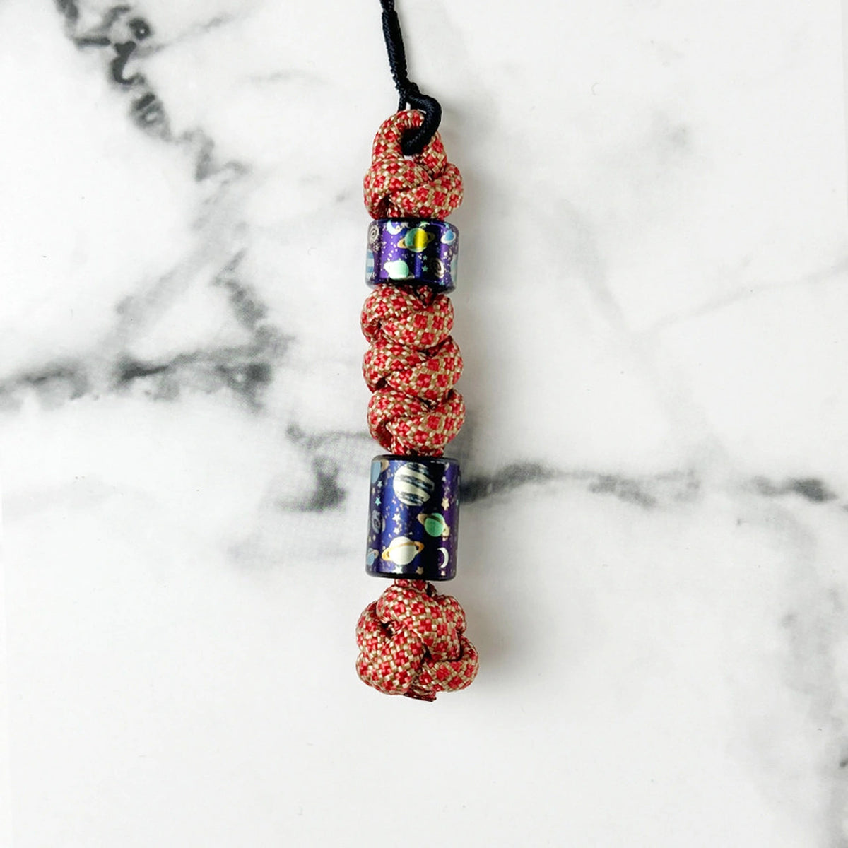 Planet Artwork Titanium Lanyard Beads: two round beads on red cord (gallery view 15).