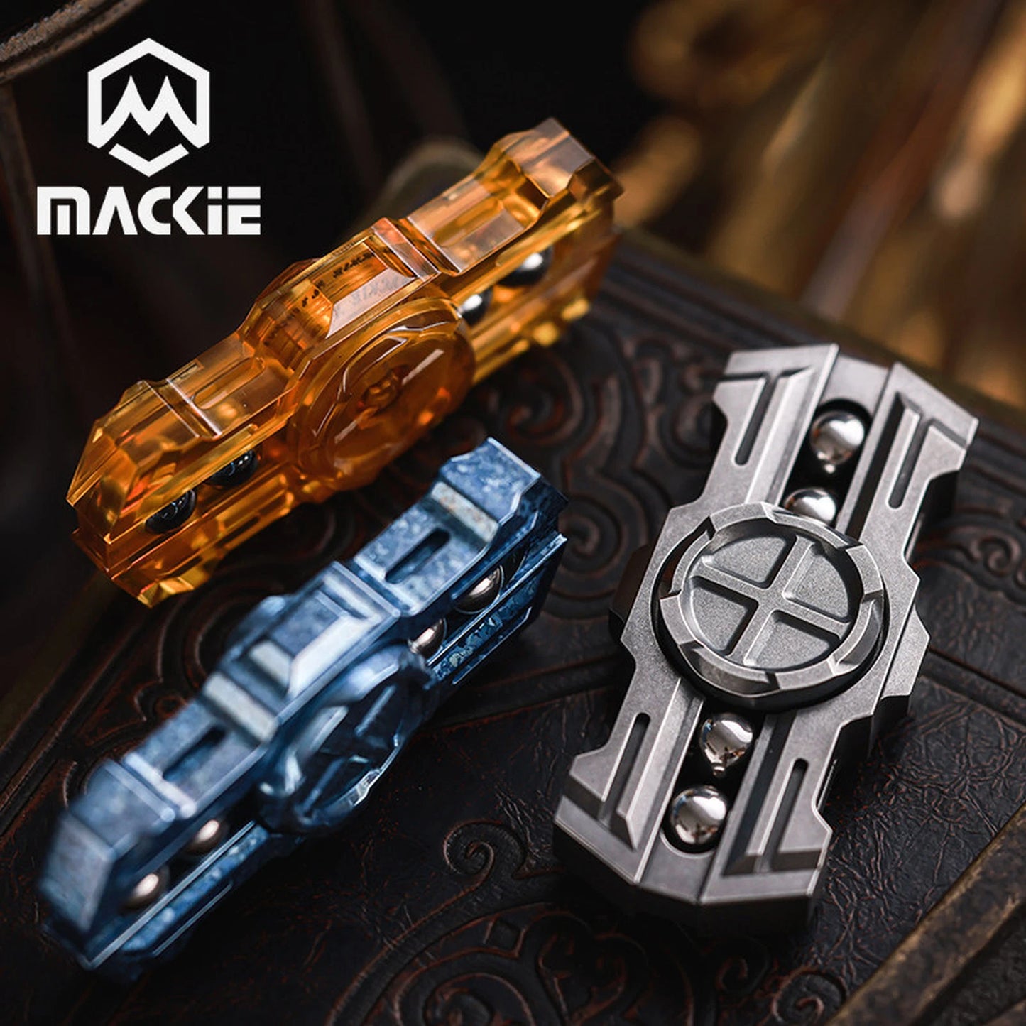 MACKIE Holy Sword fidget spinners arranged in several finishes