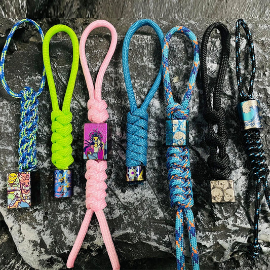 Black Paracord Lanyard Braiding Service: multicolored cord examples with separately sold beads (gallery view 01).