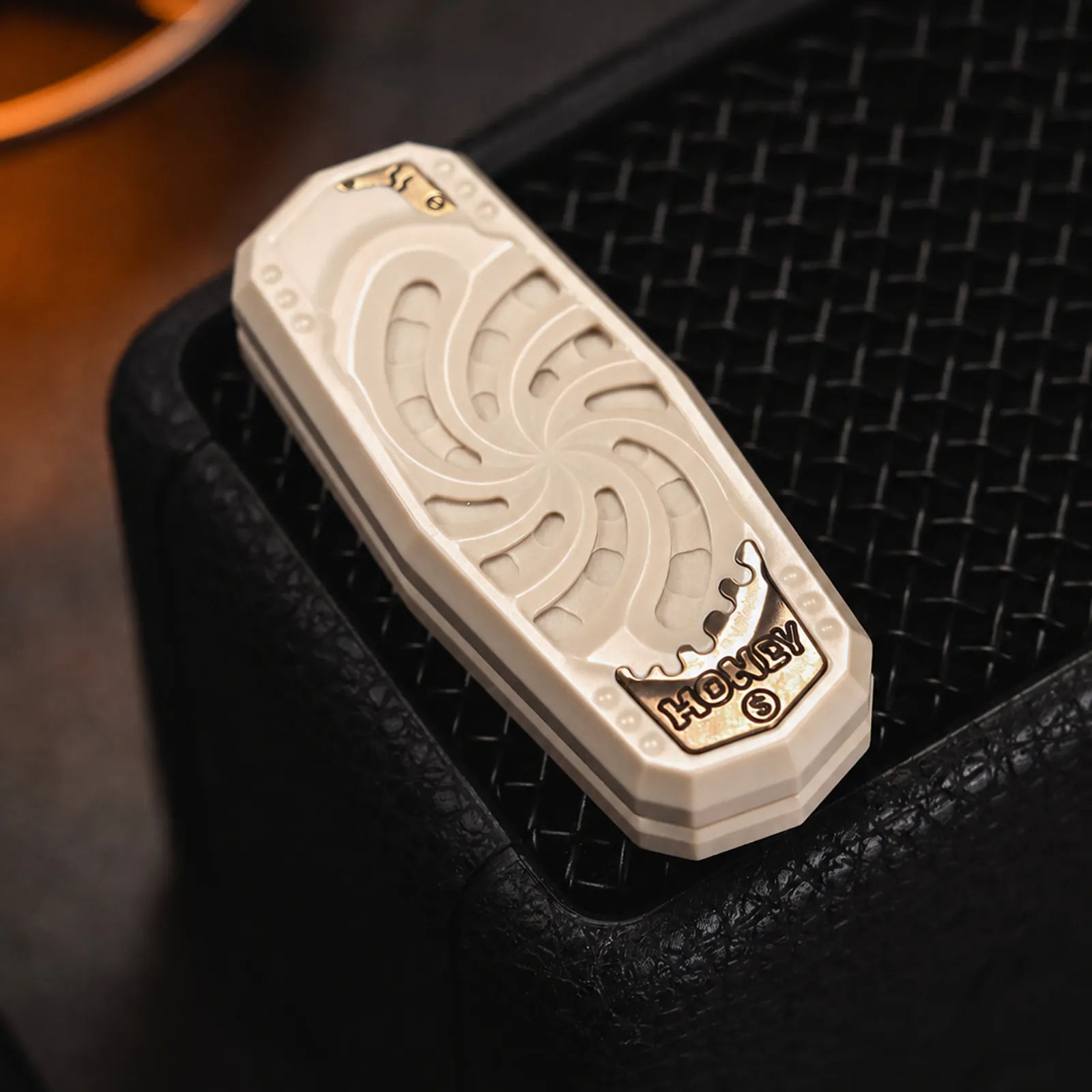 Cream white PEEK mechanical slider with spiral tactile face