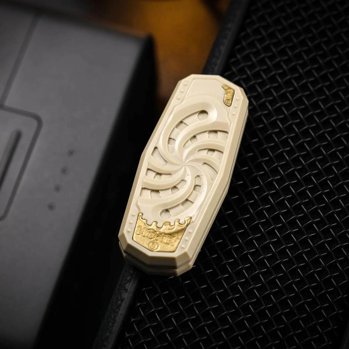 PEEK mechanical fidget slider with high and low tone track