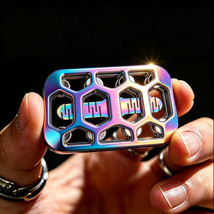Rainbow-finish open-frame slider with matching iridescent slotted insert and hexagonal windows.