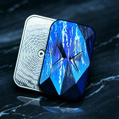 X4L Blue Storm slider showing its patterned X-motif outer face beside the grooved contact plate of the same slider.