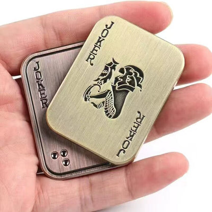 Joker-decorated slider with two offset plates held in a hand.