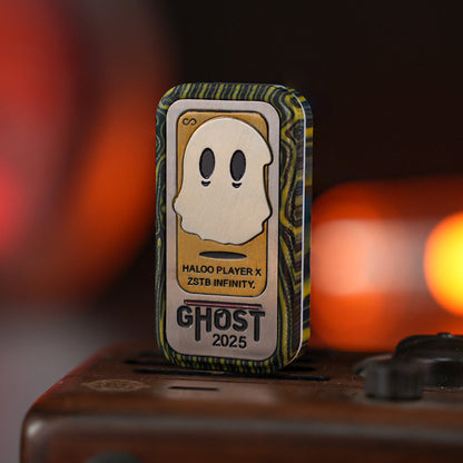 Tree-grain G10 Ghost 2025 slider with a raised ghost motif