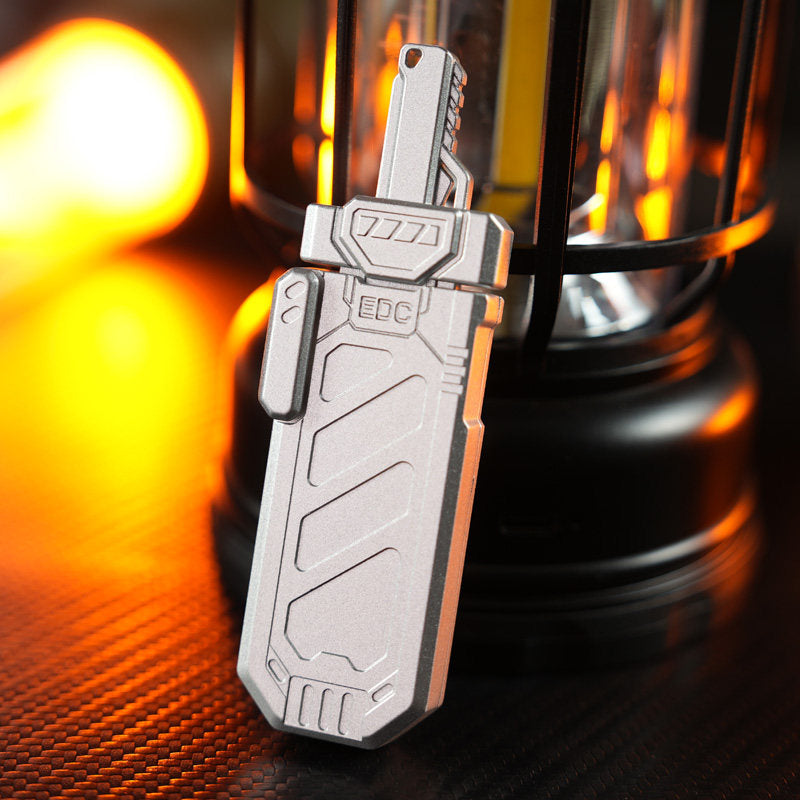 Silver-tone Sky Splitter optimized slider with EDC lettering and an engraved outer shell.