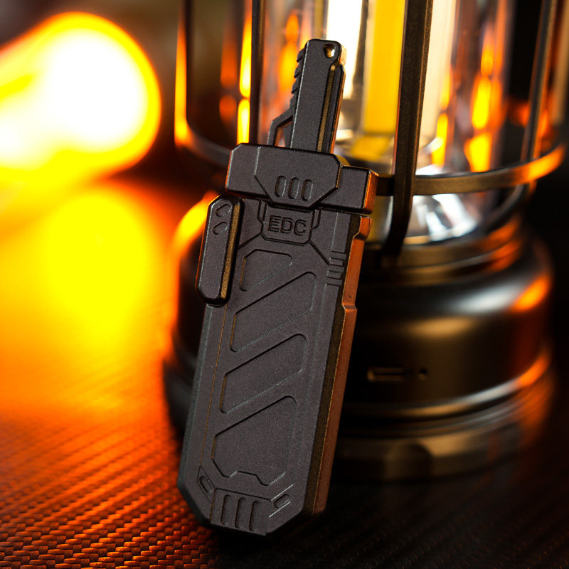 Black Sky Splitter optimized slider with EDC lettering, an engraved outer shell and a projecting handle.