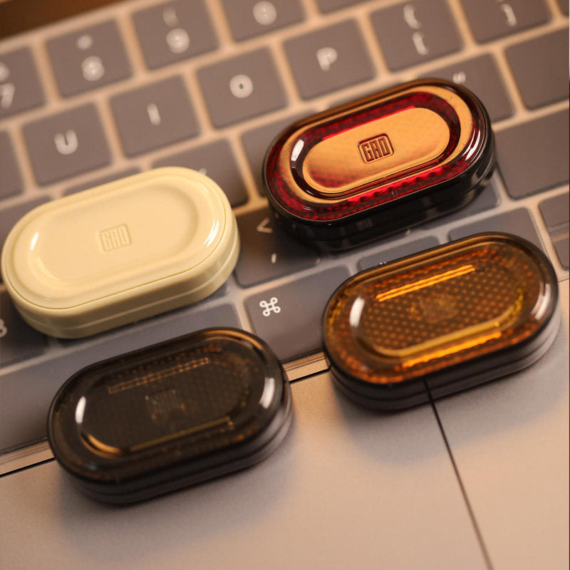 Rich Coin Gem Four-Color Magnetic Fidget Slider Set — Four-Slider Set - Cream, Red, Amber and Smoke Black