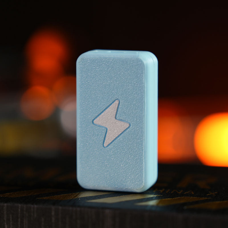 Twin-Track rectangular fidget slider in sky blue / white bolt with a textured lightning-bolt face.