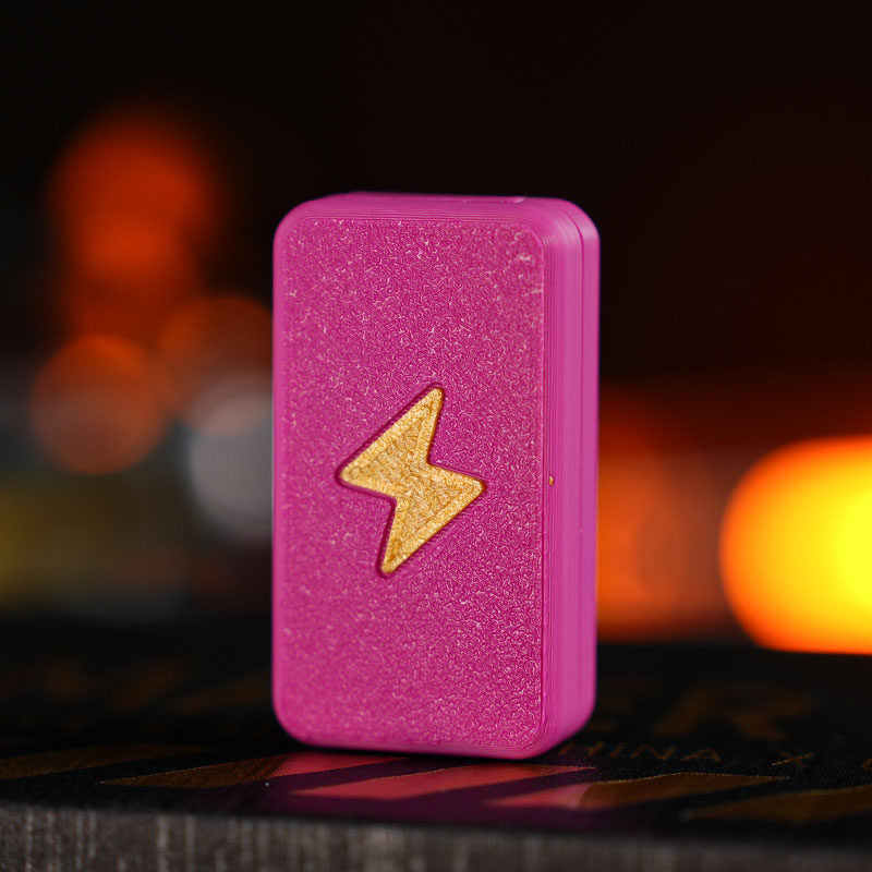 Twin-Track rectangular fidget slider in hot pink / gold bolt with a textured lightning-bolt face.