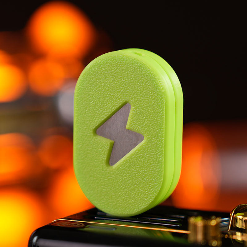 Aurora 2.0 / Avocado fidget slider with a textured pill-shaped face and a lightning-bolt motif.