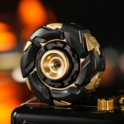 Black and gold-tone 08 spinner with a round center grip