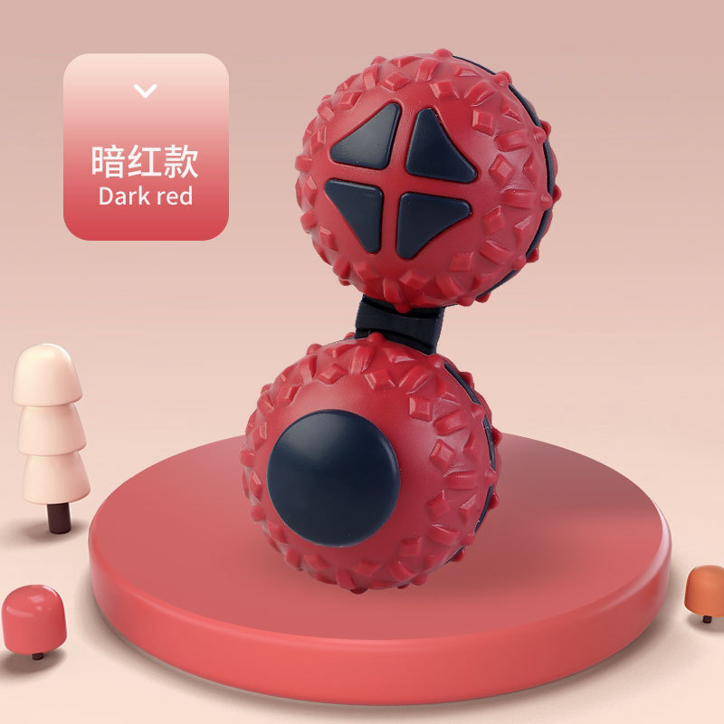 Dark-red connected dual-ball fidget toy with raised textured shells and black controls.