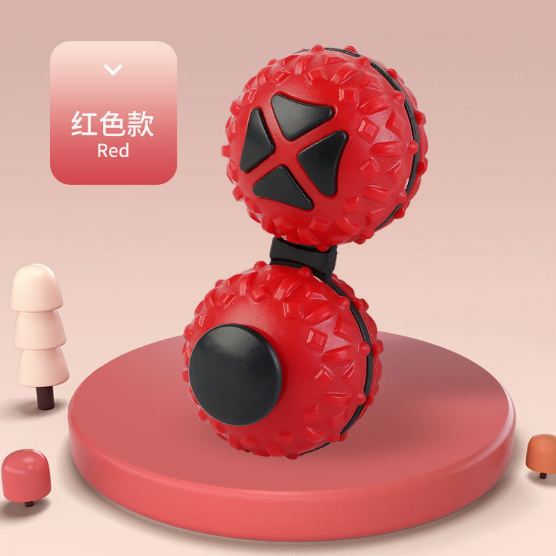 Red connected dual-ball fidget toy with black triangular buttons and a black round control.