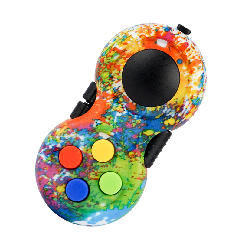 Paint-splatter mini controller fidget with multicolored buttons and a black joystick.