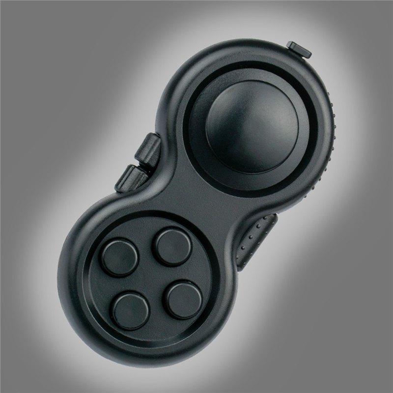 All-black mini controller fidget with four round buttons and a raised joystick.