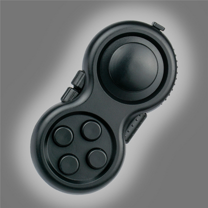 All-black mini controller fidget with four round buttons and a raised joystick.