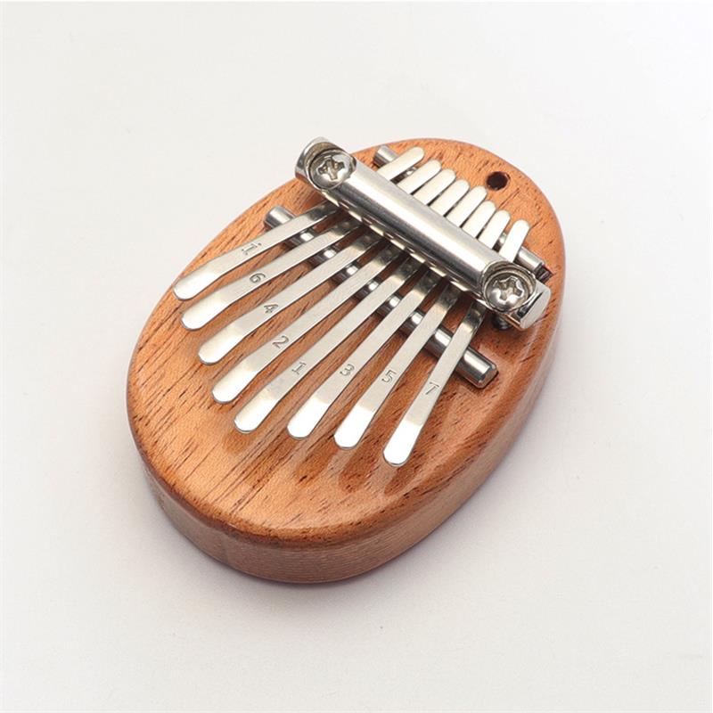 Eight-Key Mini Kalimba in Wood or Clear Acrylic — Solid Wood / Oval