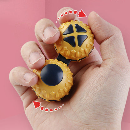 Yellow dual-ball fidget toy held in one hand with rotation arrows