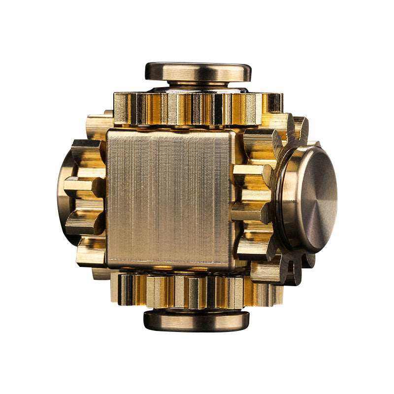 Copper-tone linked-gear fidget cube on a white background