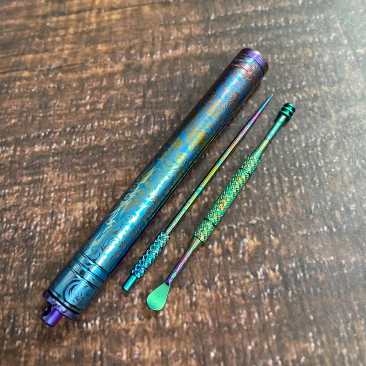 Patterned Titanium Toothpick & Ear Pick: case toothpick and ear pick arranged on wood (gallery view 03).