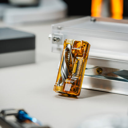 01EDC Gene Capsule Mechanical Fidget Slider with a Linked Double-Helix Display — Amber Orange — PEI and Steel