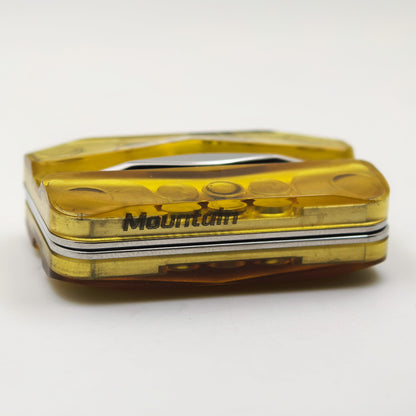 The amber PEI Empty Mountain slider in its closed, layered position